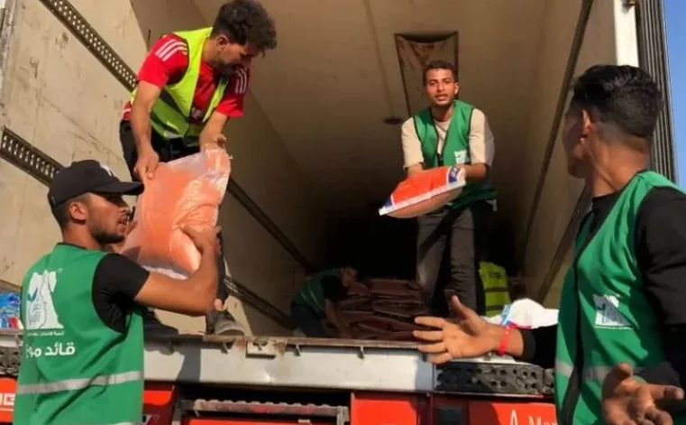 Aid delivery waits to enter Gaza from Egypt at Rafah crossing