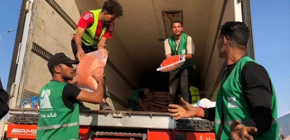 Aid delivery waits to enter Gaza from Egypt at Rafah crossing