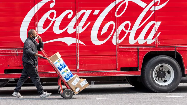 Coca-Cola beats earnings estimates, raises outlook