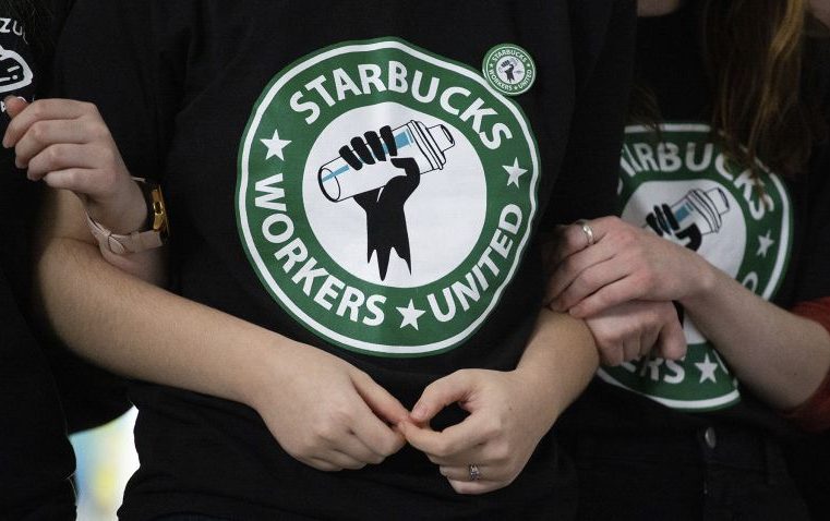 Starbucks is handing out pay hikes and new benefits to workers